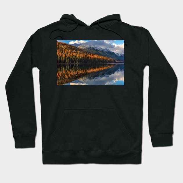 Mountain Peaks Reflect Into Bowman Lake In Autumn Glacier National Park Hoodie by HammiltenJohn